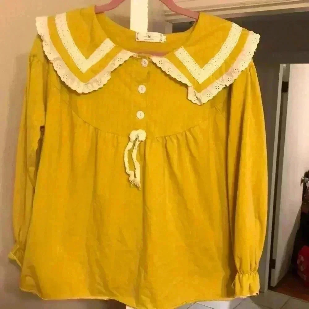 Vogue Homewear unique long sleeve top.